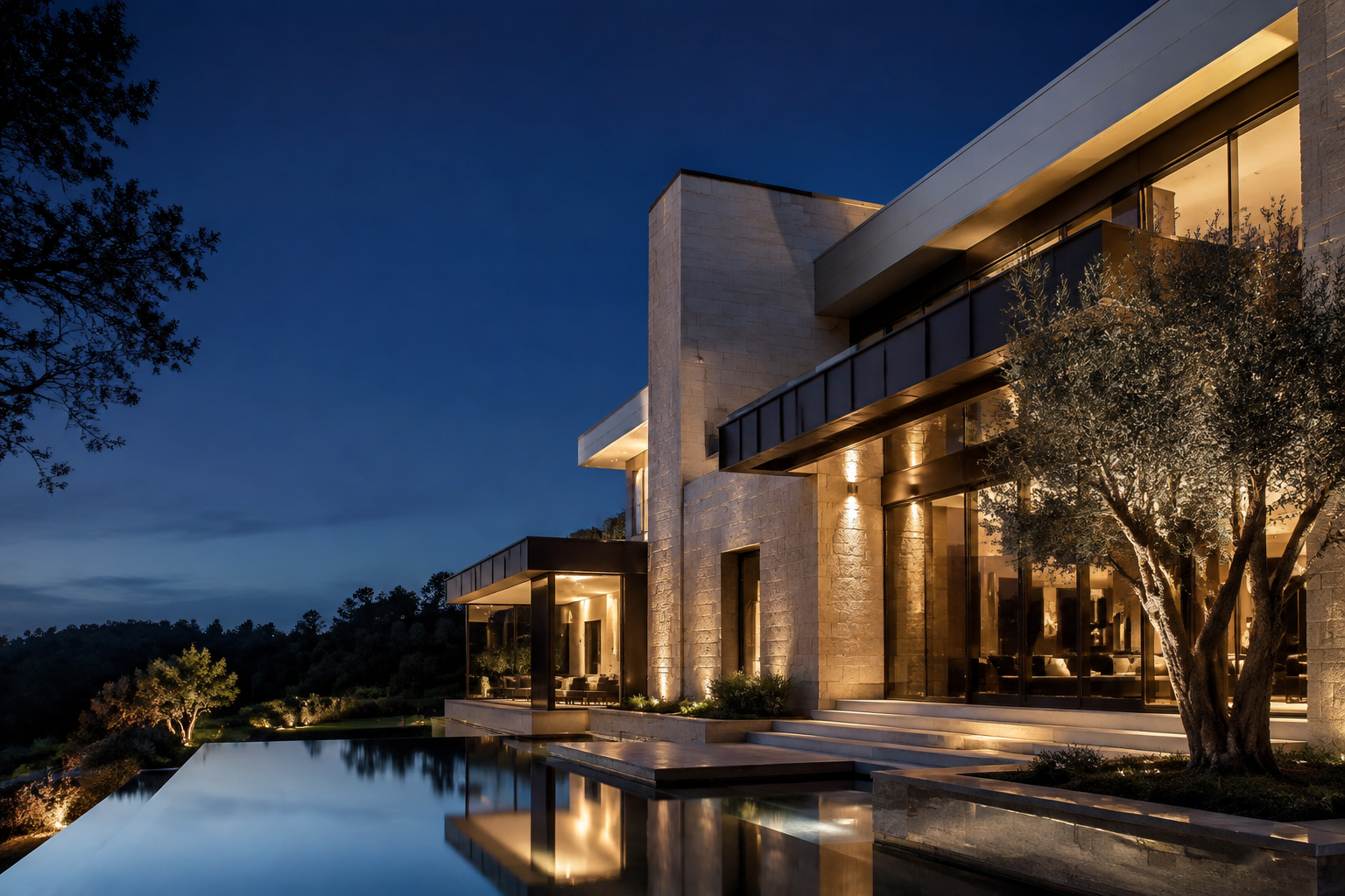 Contemporary limestone residence at dusk